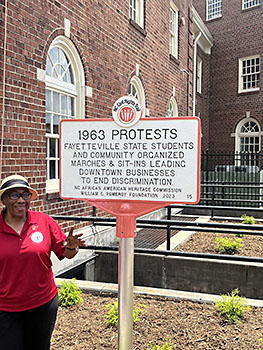 JoAnn Adams at NC Civil Rights Trail Ceremony Standing in Front of Civil Rights Marker Courtesy of Rep Charles Smith